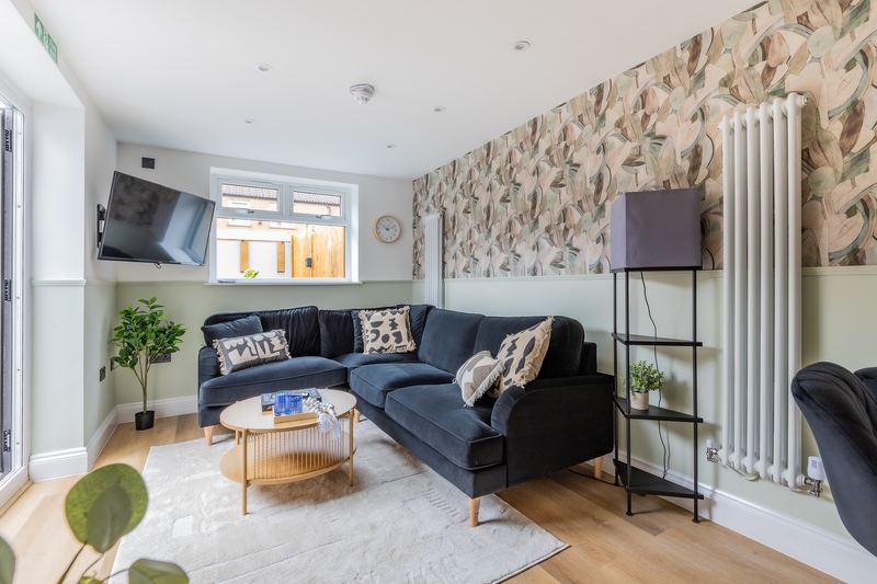 Living area with feature wallpaper