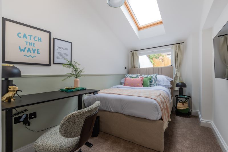 Loft bedroom with desk