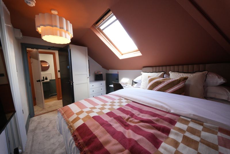 Top floor bedroom with roof window