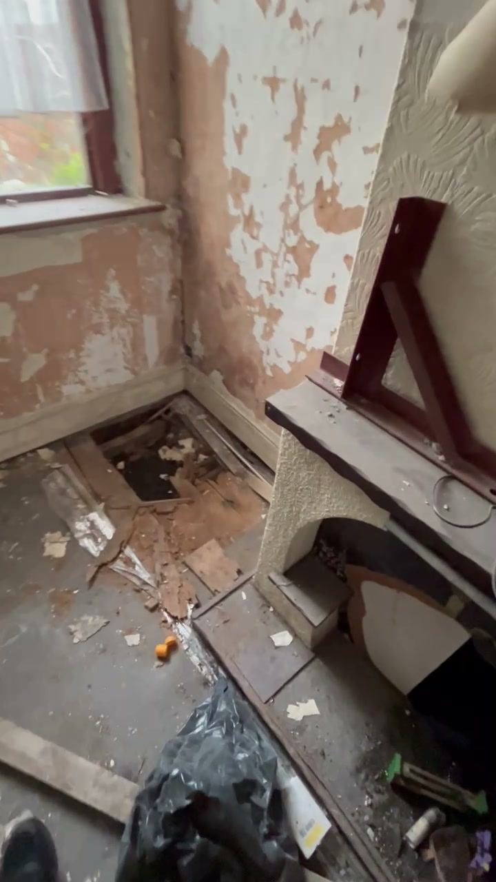 The original fireplace, before the strip out
