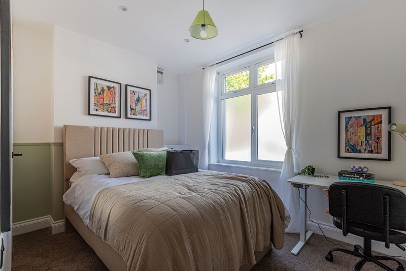 Bedroom with artwork